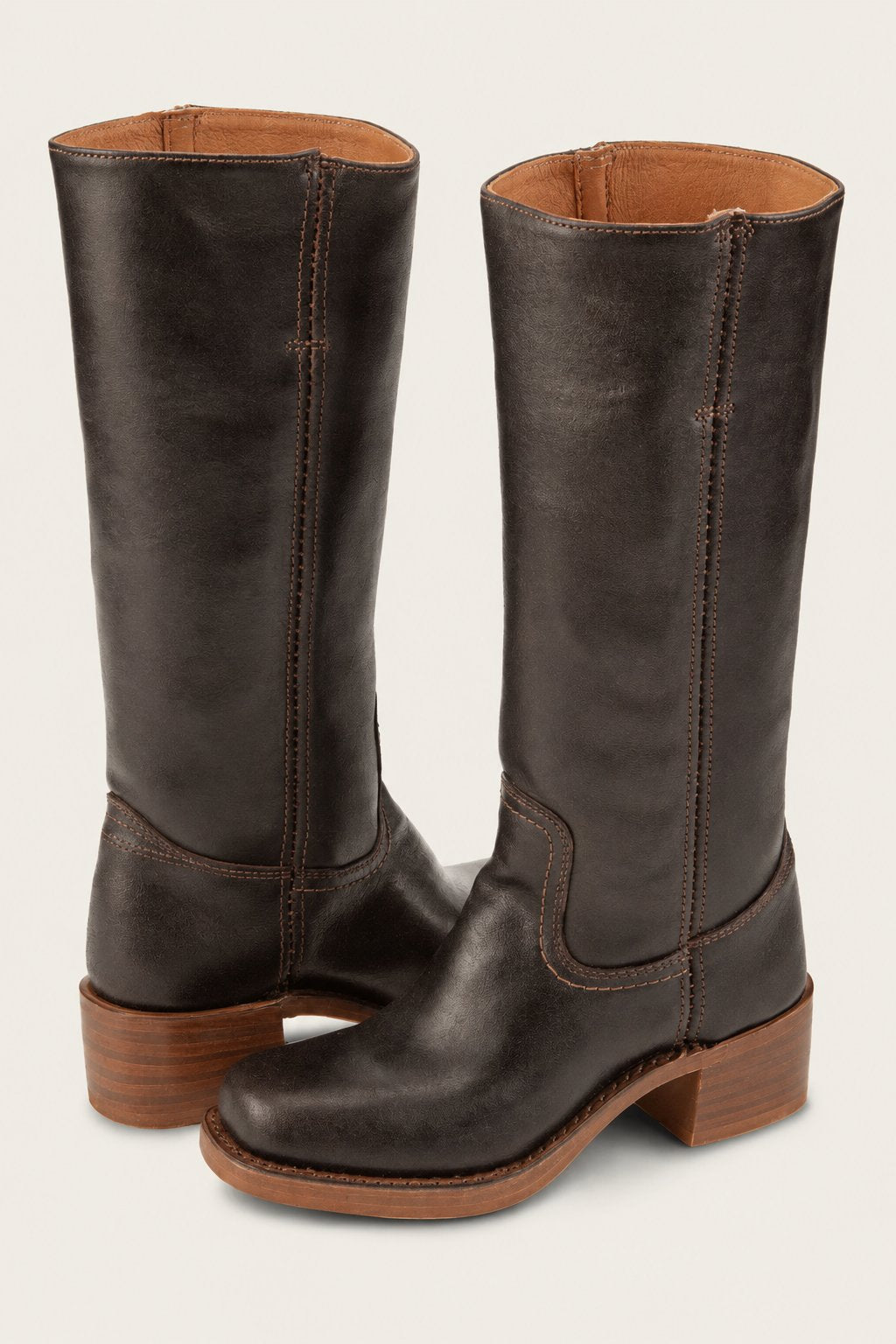 Women's brown leather knee-high block heel boots. Elegant & chic fall/winter footwear for versatile style.