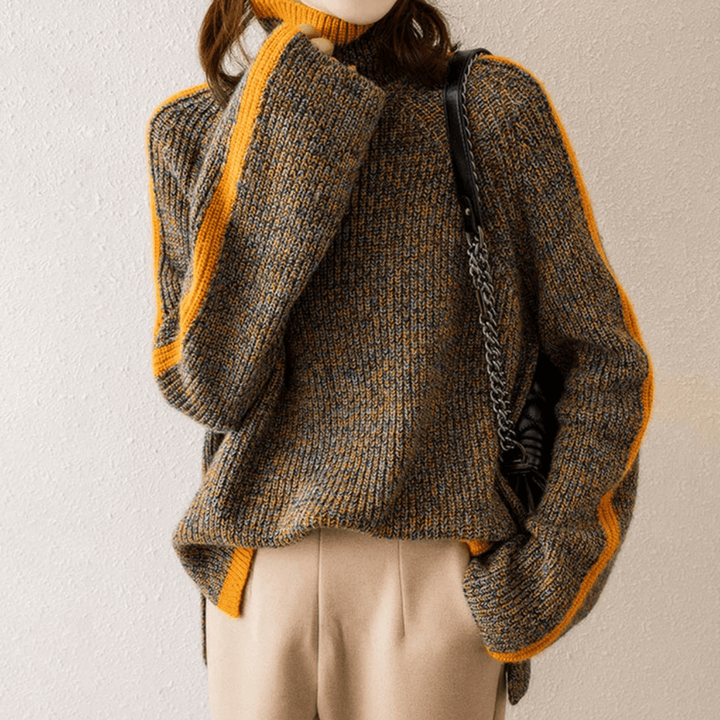 Warm women's long sleeve brown turtleneck sweater in a mixed knit, ideal for casual cozy winter wear.