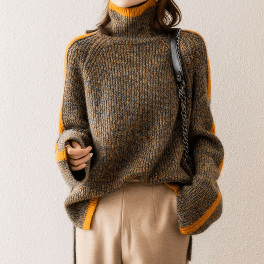 Stylish women's mixed knit brown turtleneck sweater for elegant winter comfort. A versatile cozy top.