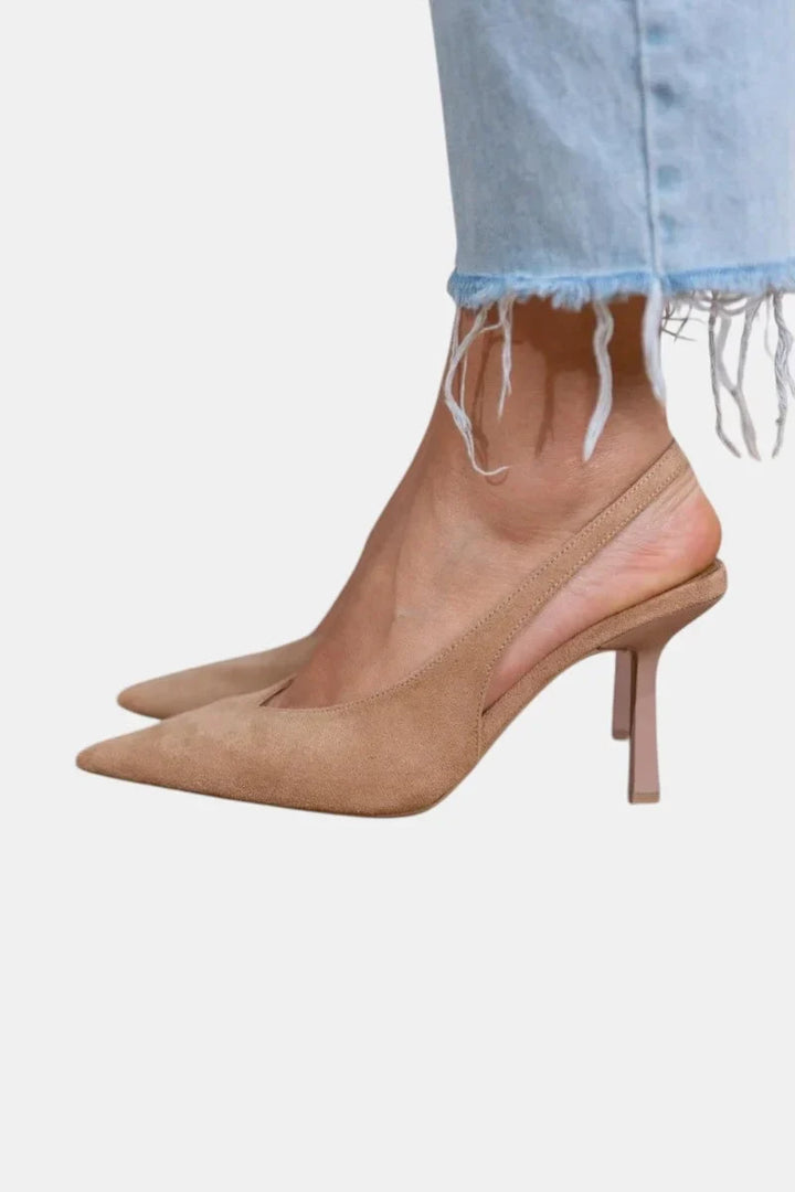 Women's brown pointed-toe slingback stiletto pumps for elegant formal wear.