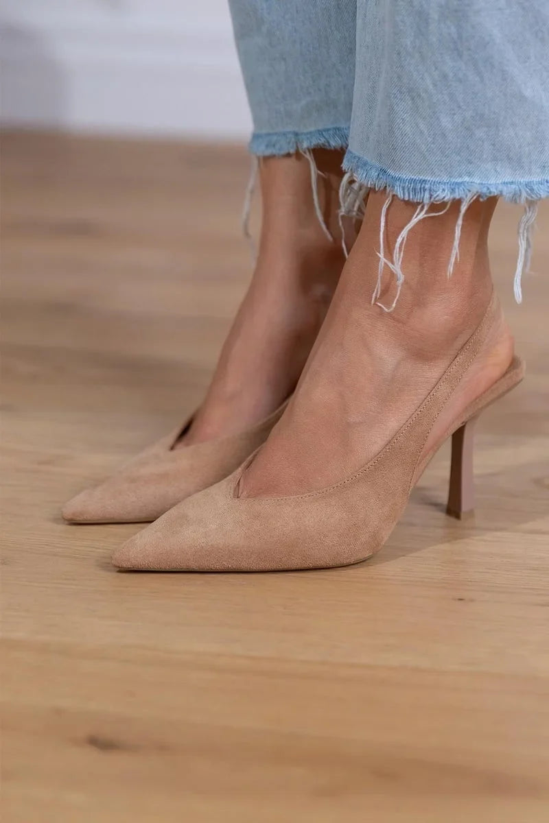 Versatile brown pointed-toe stiletto pumps, featuring a comfortable slingback design for women.