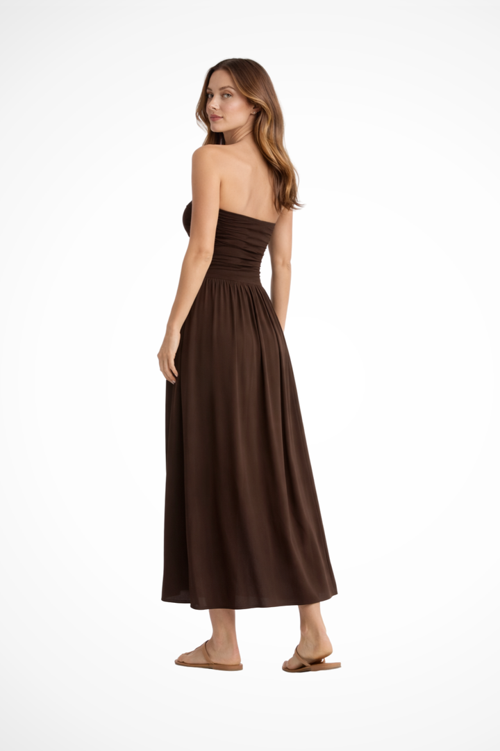 Flowing brown strapless pleated maxi dress for women, perfect for summer parties.