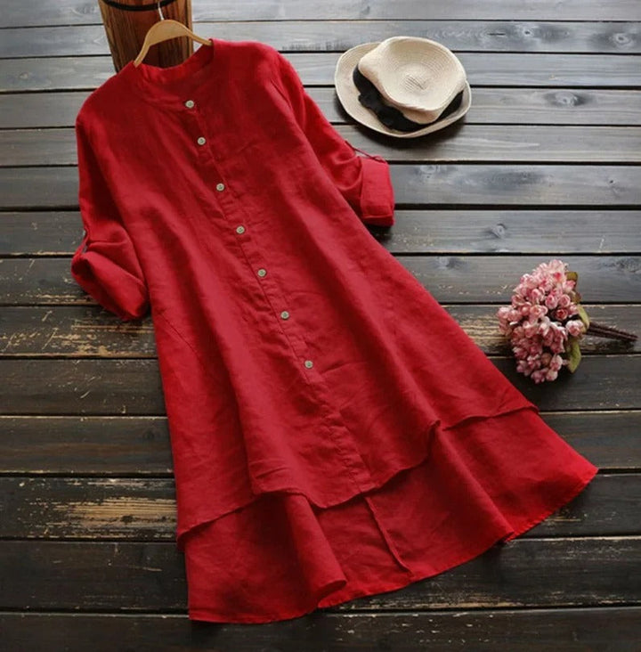 Comfortable women's casual button-down midi dress. Elegant layered hem and long sleeves for spring.