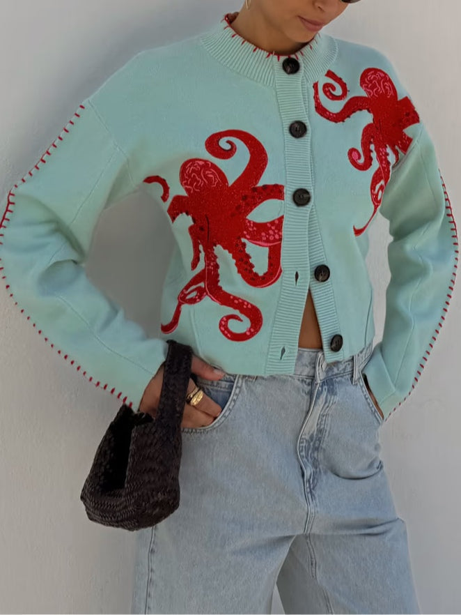 Stylish women's cardigan with a distinctive octopus graphic print, button-front, and long sleeves for casual layering.