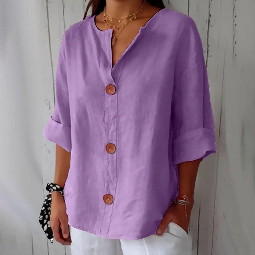 Stylish women's fashion blouse: linen, button front, three-quarter sleeves. An elegant and versatile casual top.