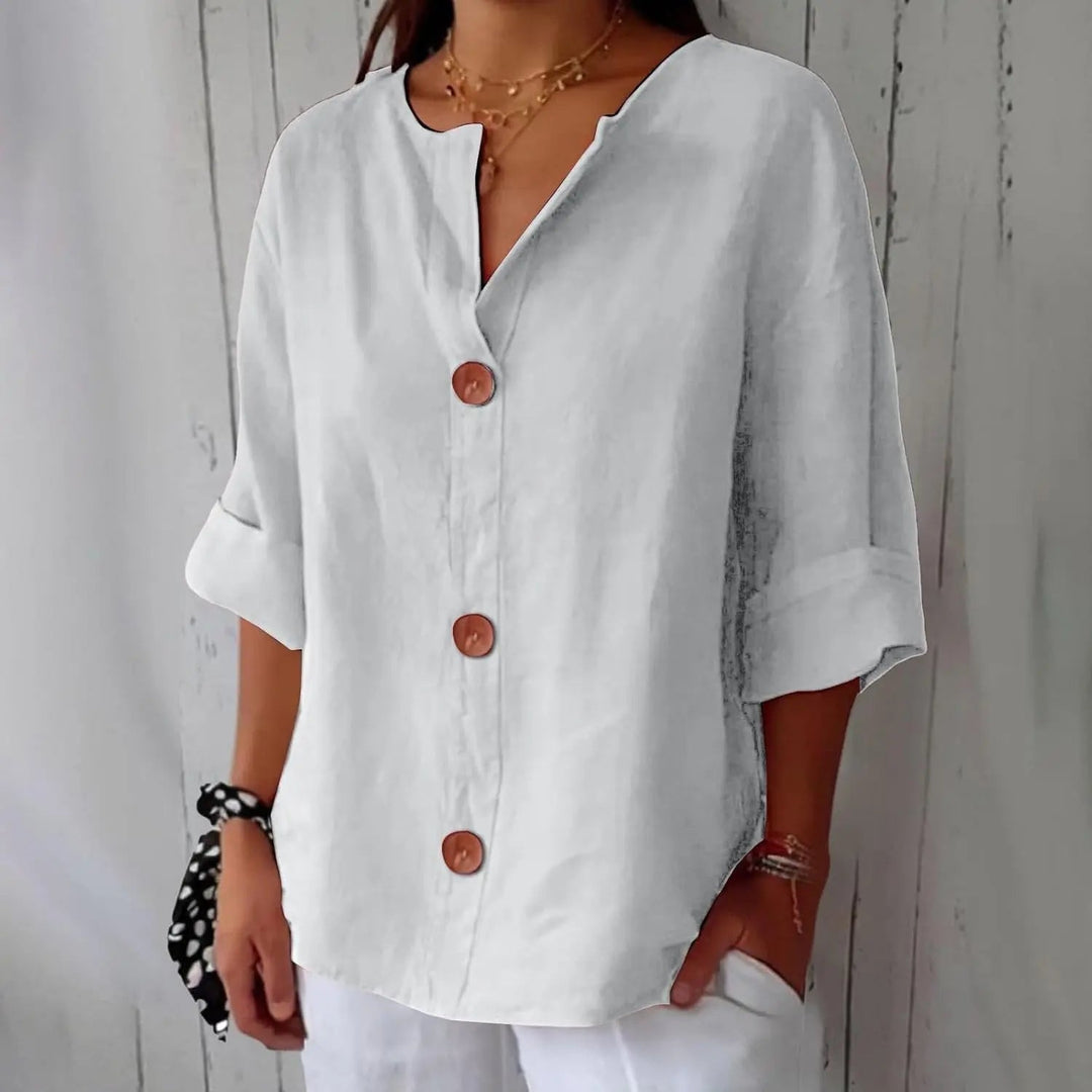 Effortless women's linen button front blouse with 3/4 sleeves. A versatile, stylish casual top for spring/summer.