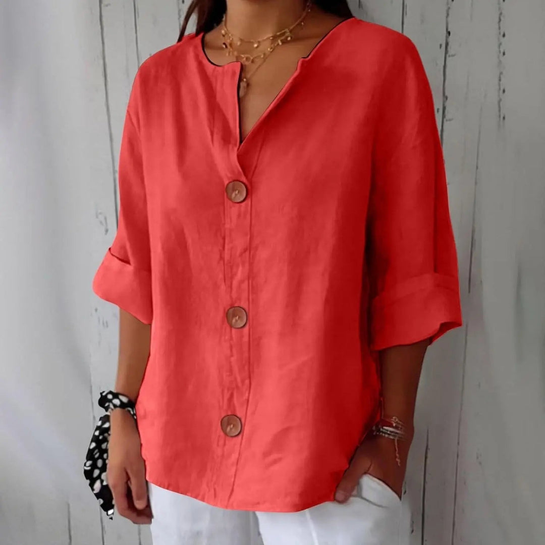 Women's elegant linen blouse with button front & three-quarter sleeves. Perfect for versatile spring & summer fashion.