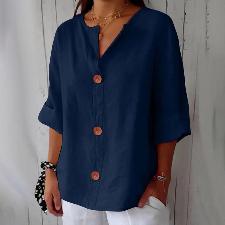Casual yet stylish women's linen blouse, button front & three-quarter sleeves, great for everyday relaxed fashion.