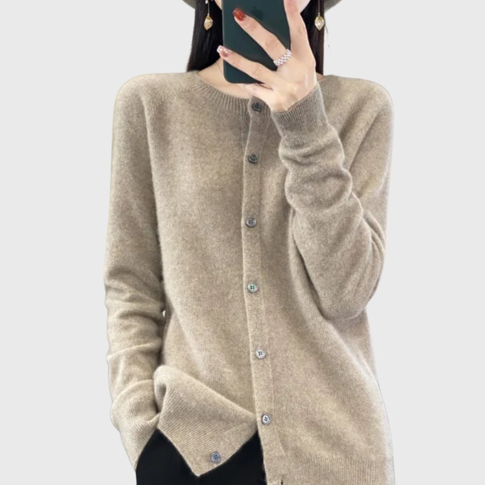 Chic women's button-front round neck cardigan in a comfortable relaxed fit, ideal for office casual.