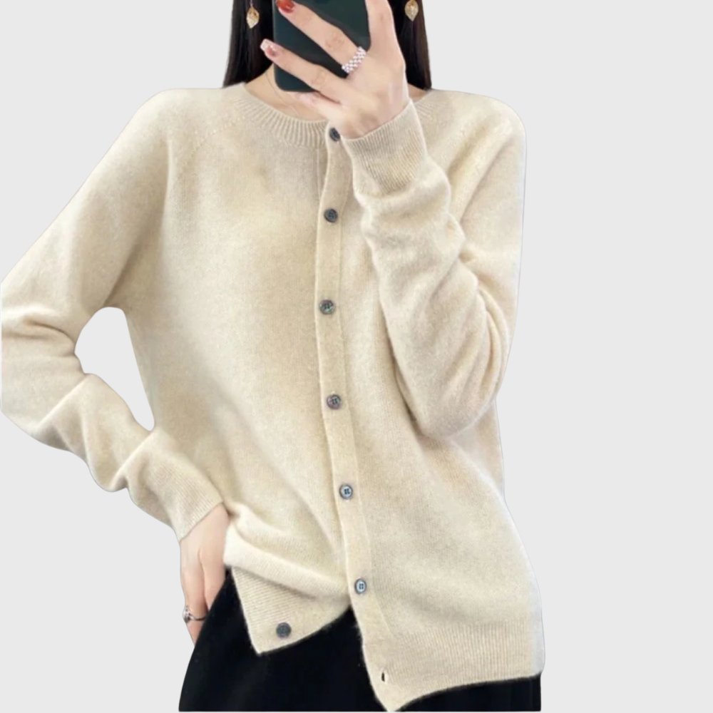 Versatile women's layering cardigan with a classic button front and elegant round neck design.
