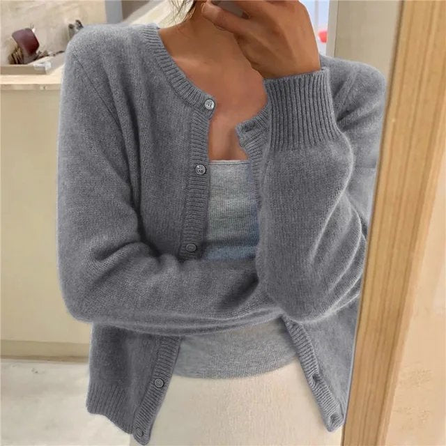 Women's button-front round neck cardigan, ideal for versatile layering and everyday comfort.