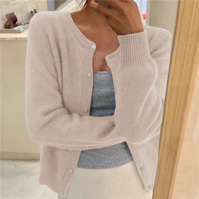 Versatile women's button-front cardigan for layering, featuring a cozy round neck and comfortable fit.