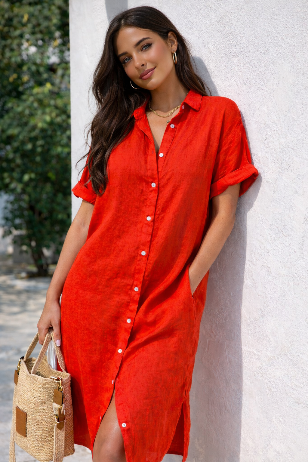 Women's button-front shirt dress with a relaxed fit, perfect for casual summer wear. Versatile midi length.