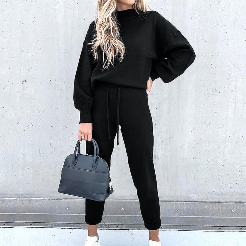 New women's 2-piece casual outfit set. Soft cotton blend, elastic waist, and relaxed fit for comfortable loungewear.