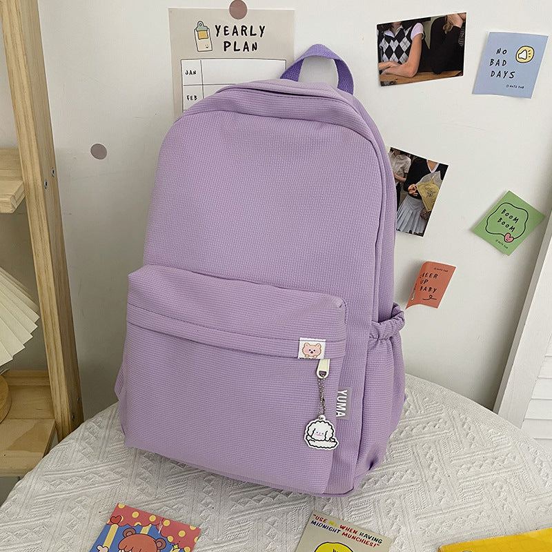 Women's casual black ruffled texture backpack, stylish and functional for everyday use.