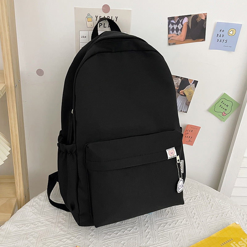 Elegant women's PU leather backpack with unique ruffled texture, perfect for school, work, or travel.