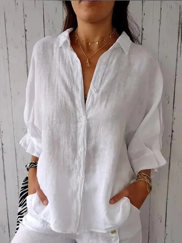 Women's casual button-up shirt, long sleeve, comfortable for everyday wear.