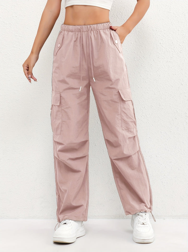 Women's casual cargo pants with drawstring waist, multiple utility pockets, and relaxed fit for everyday comfort.
