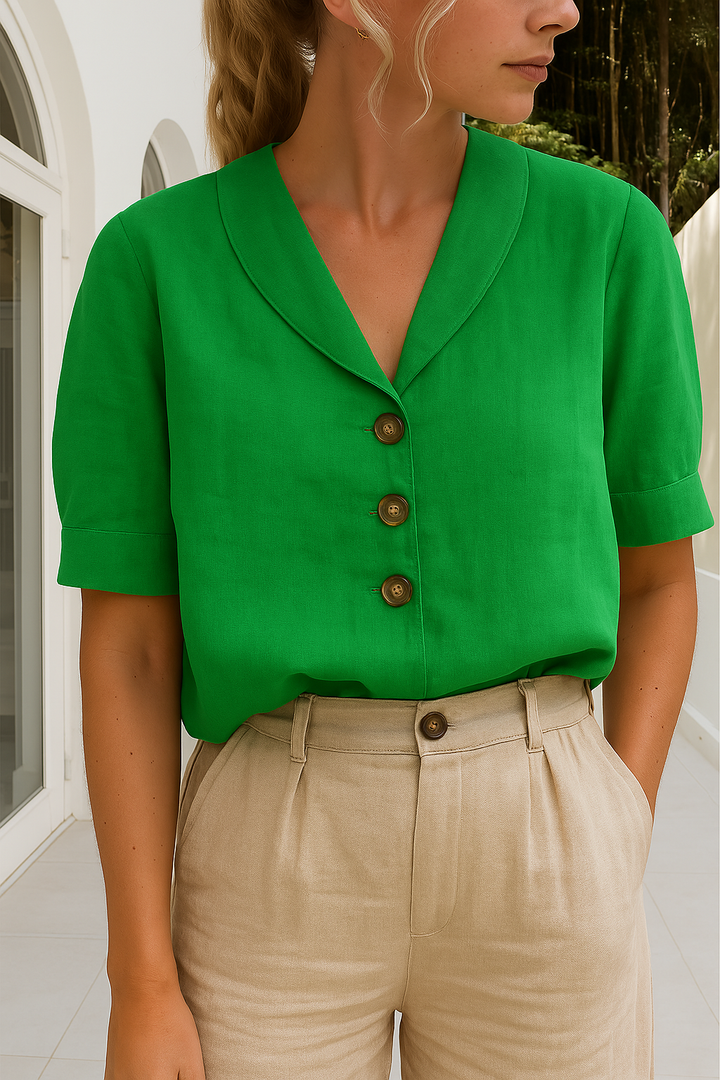 Chic ladies' shirt featuring refined button details & an elegant envelope neck, ideal for versatile daily wear.