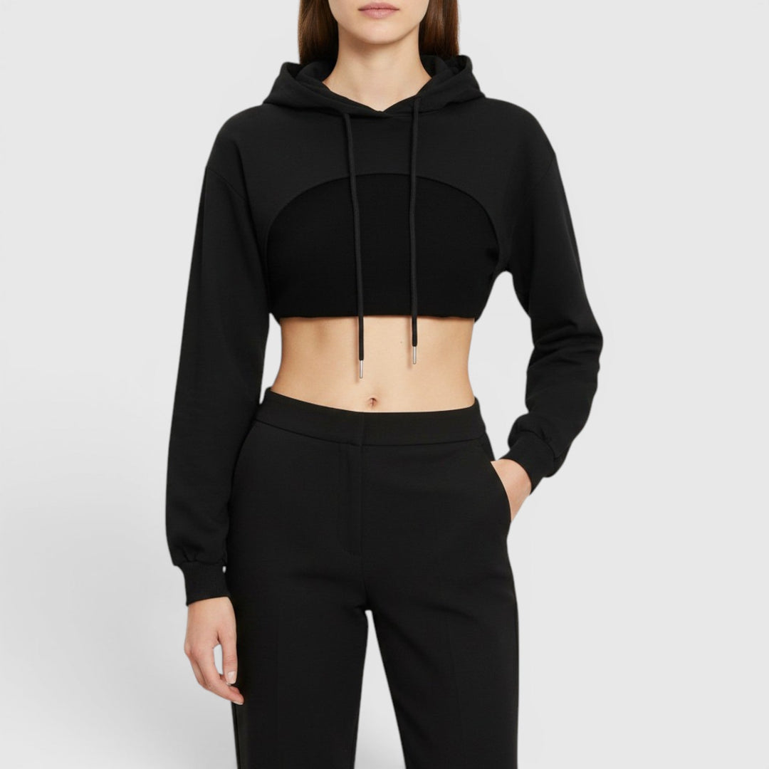 Women's casual cropped hooded pullover sweatshirt, perfect for modern everyday wear and comfort.
