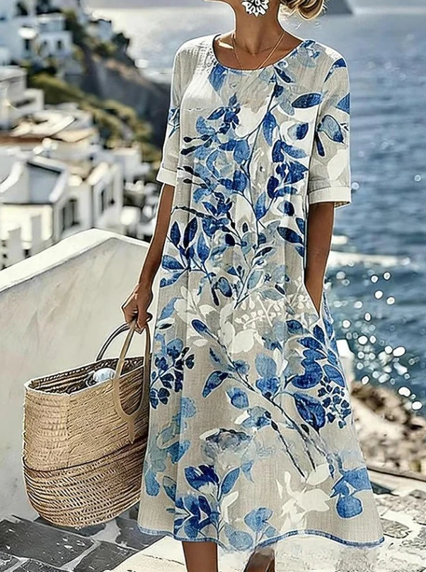 Relaxed fit women's floral boho maxi dress, a comfortable and chic option for warm weather and holiday wear.