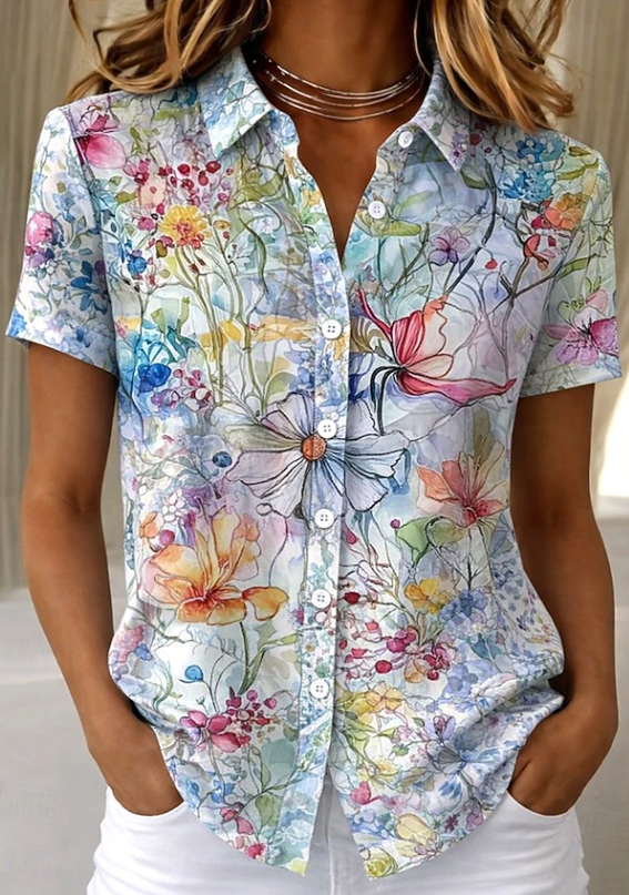 Relaxed fit floral print women's blouse with buttons, ideal for casual summer fashion.