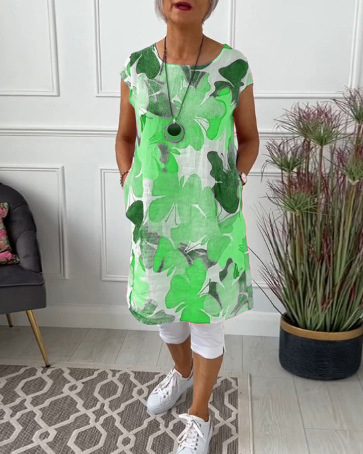 Relaxed fit women's floral summer dress, comfortable, easy care, vibrant print.