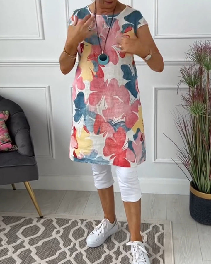 Stylish women's floral printed dress, comfortable and versatile for summer fashion.