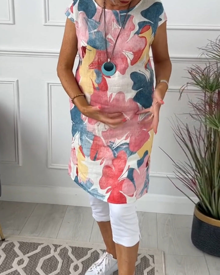 Relaxed fit floral summer dress for women, knee-length, ideal for casual spring wear.