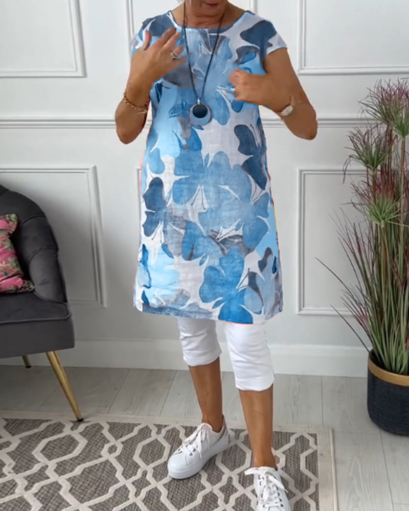 Lightweight women's floral summer dress, knee-length, easy care, relaxed silhouette.