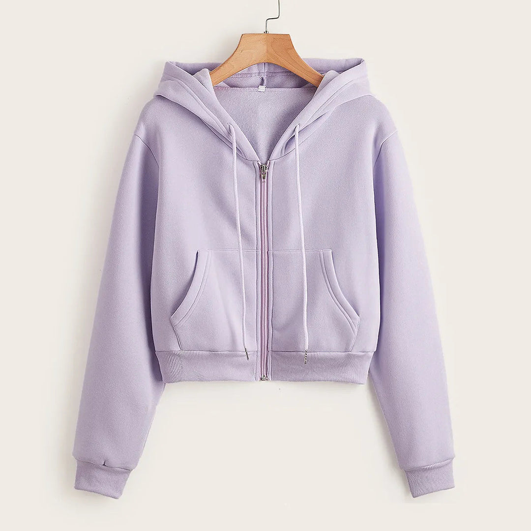 Trendy women's hooded crop top, showcasing a modern, versatile casual style.