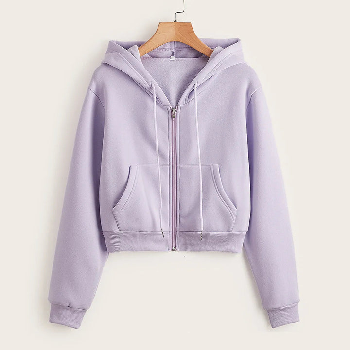 Trendy women's hooded crop top, showcasing a modern, versatile casual style.