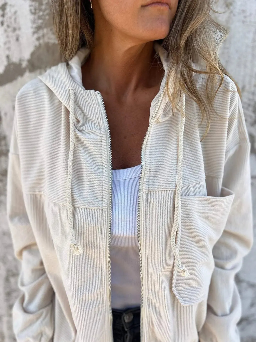 Casual women's fall jacket, hooded, offering comfort and style for everyday versatile wear.