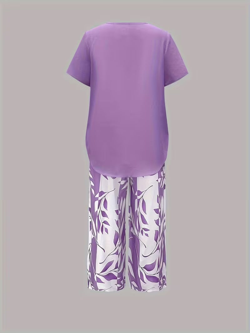 Chic women's two-piece set featuring a stylish leaf print, perfect for casual summer days.
