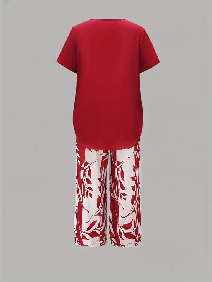 Women's summer leaf print two-piece casual set, relaxed fit and fashion-forward.