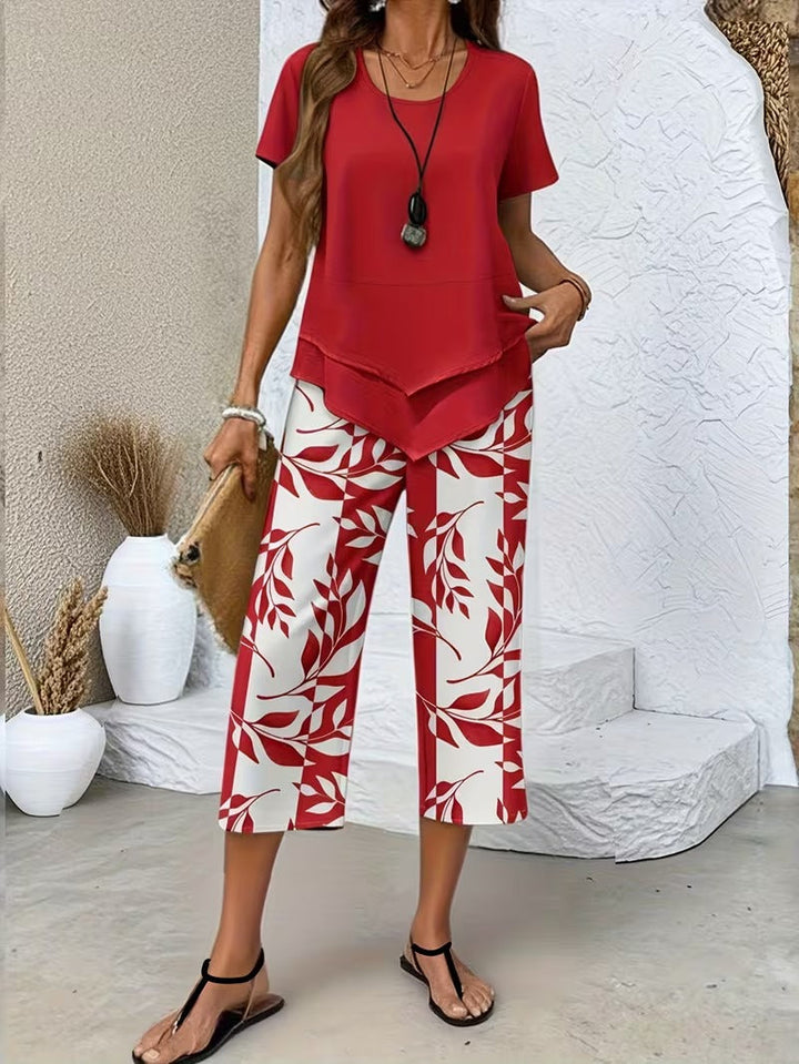 Stylish women's matching casual outfit, unique leaf print two-piece for summer fashion.
