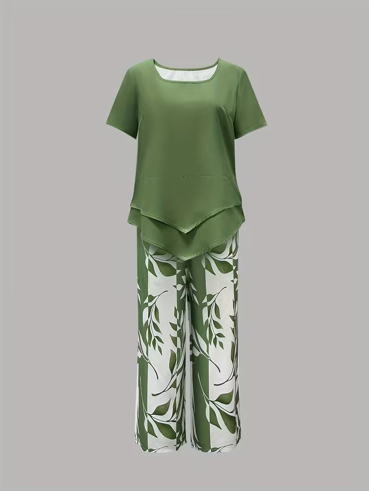 Vibrant botanical leaf print on women's casual two-piece summer outfit, close-up detail.