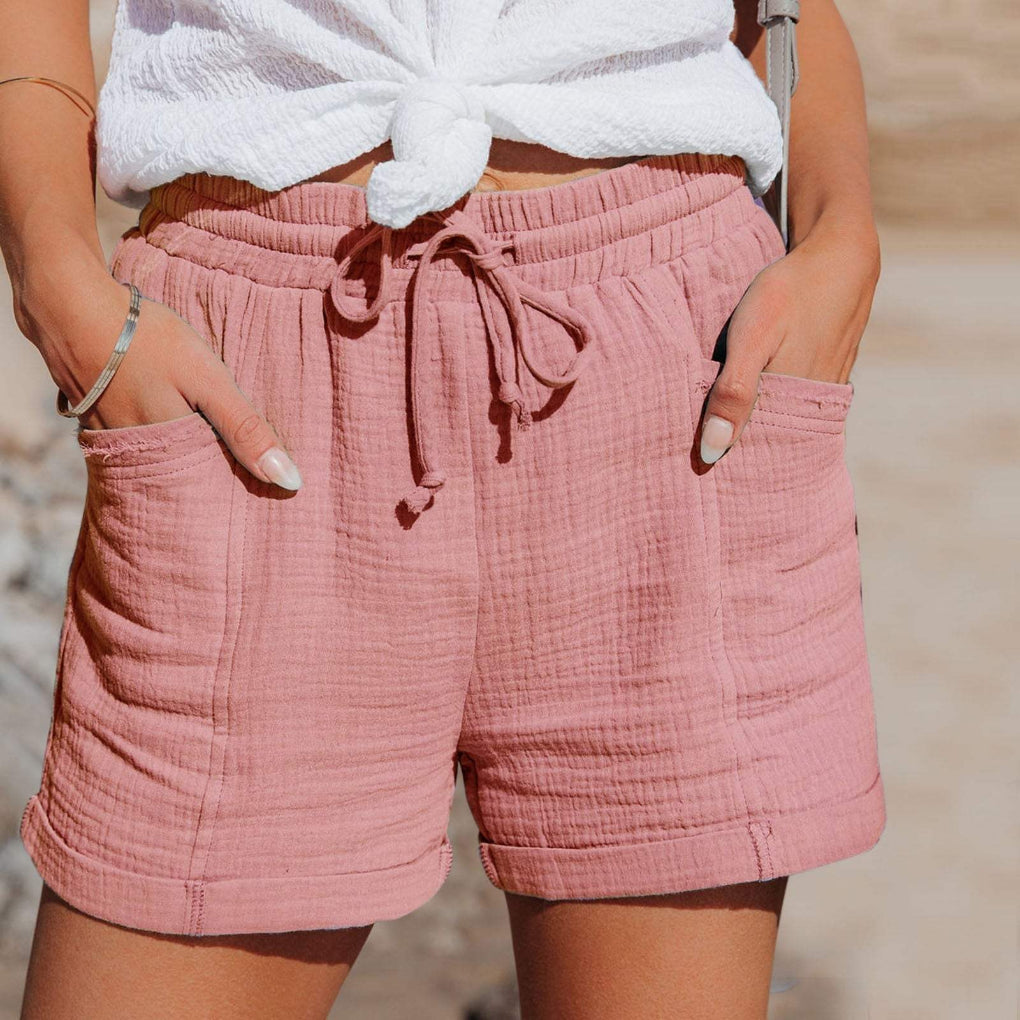 Versatile women's casual shorts, lightweight and breathable with an elastic waist, drawstring, and convenient pockets.
