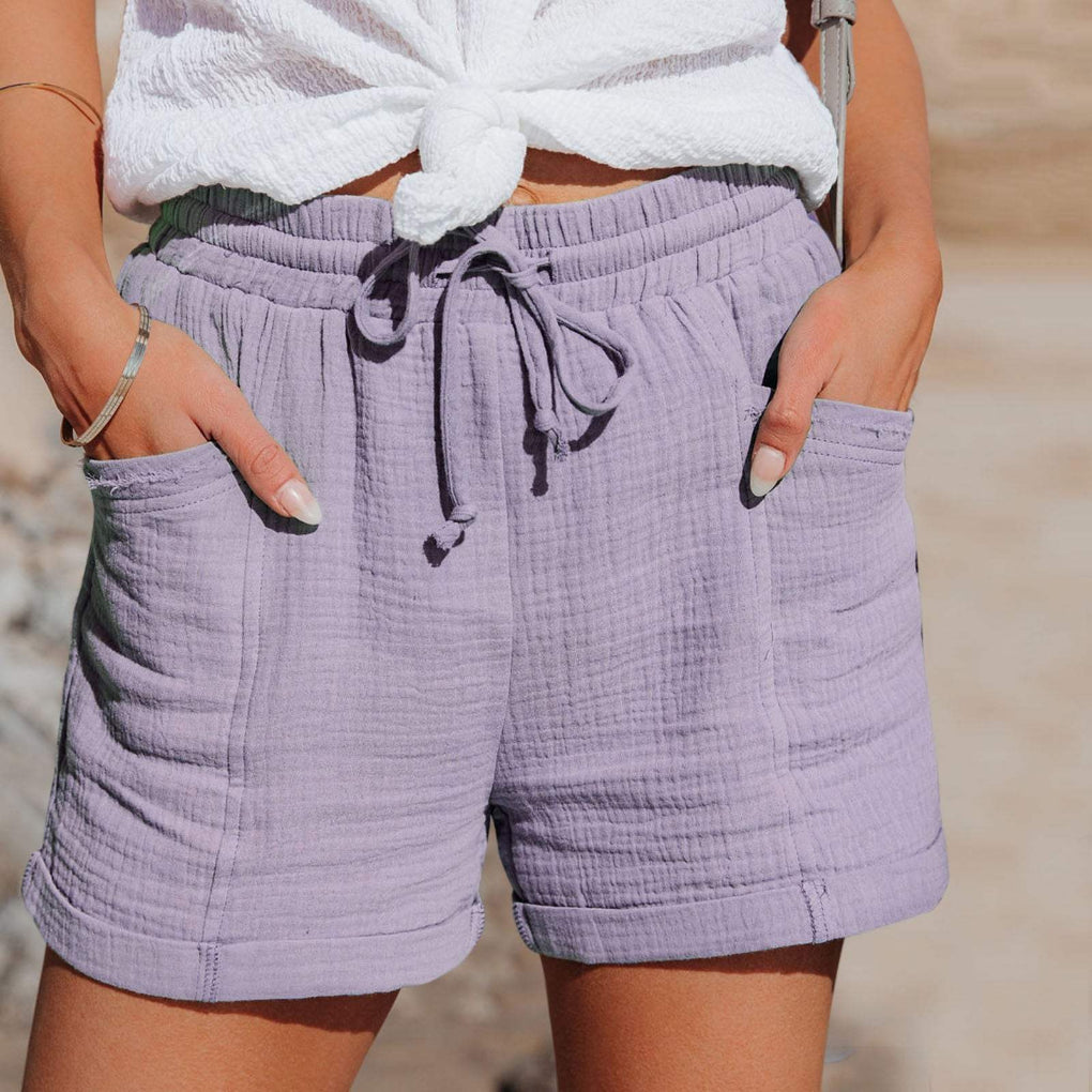 Everyday relaxed fit women's lightweight shorts. Comfortable elastic waist, drawstring, & pockets. Great for summer activities.