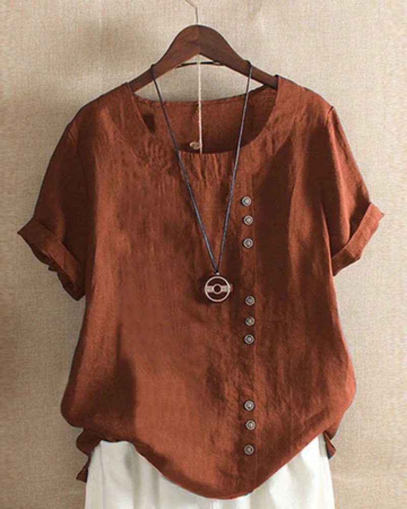 Oversized women's linen tunic blouse, button front, short sleeve, ideal for versatile summer casual style.