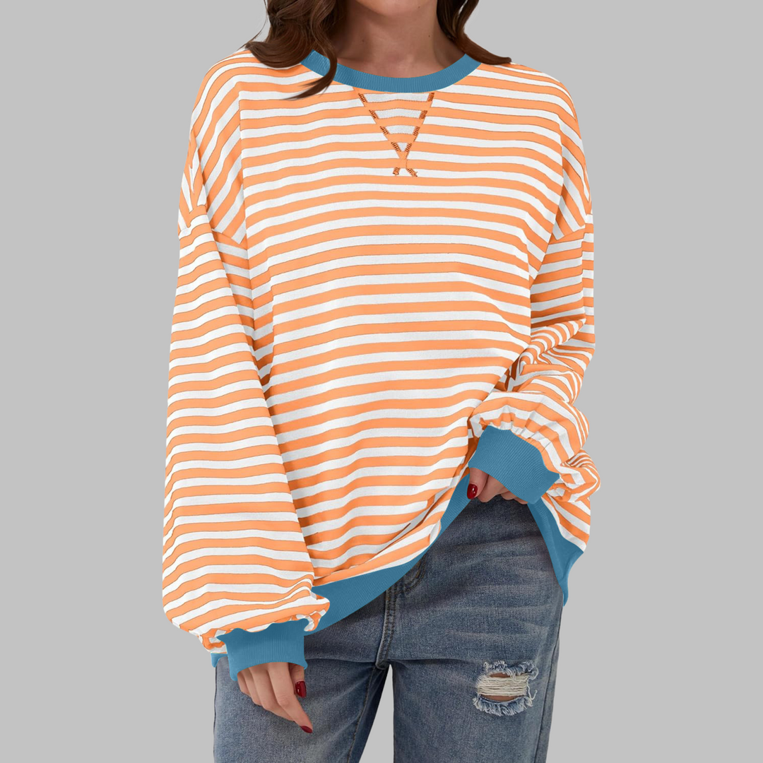 Front view of a women's long sleeve striped sweatshirt, perfect for casual, everyday fashion.