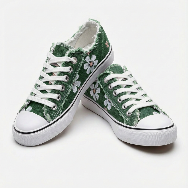 Unique women's casual sneakers with delicate floral embroidery & practical lace-up closure. Low-top design.