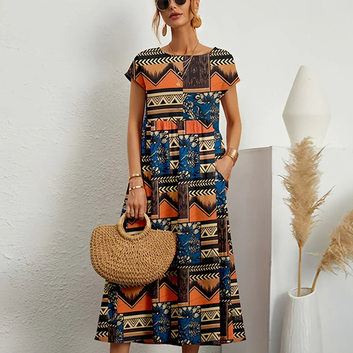 Women's casual midi dress with cap sleeves & round neck. Relaxed fit, comfy for summer & spring.