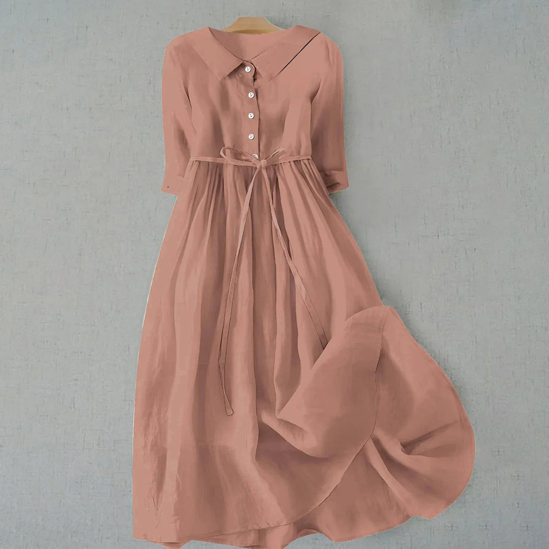 Women's elegant midi dress featuring a collar, 3/4 sleeves, & tie-waist. Comfortable casual spring fashion.
