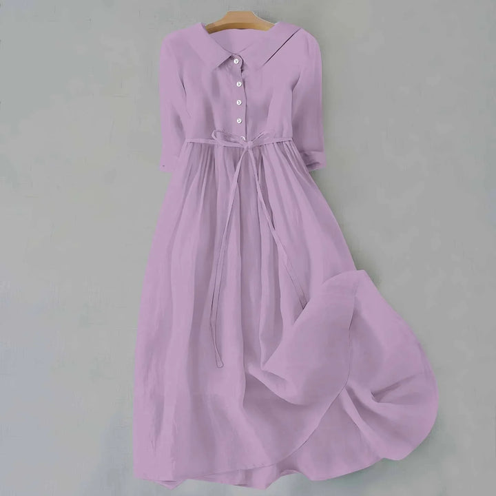 Women's midi dress, 3/4 sleeves, elegant collar, & tie-waist. Flowy & comfortable for casual occasions.