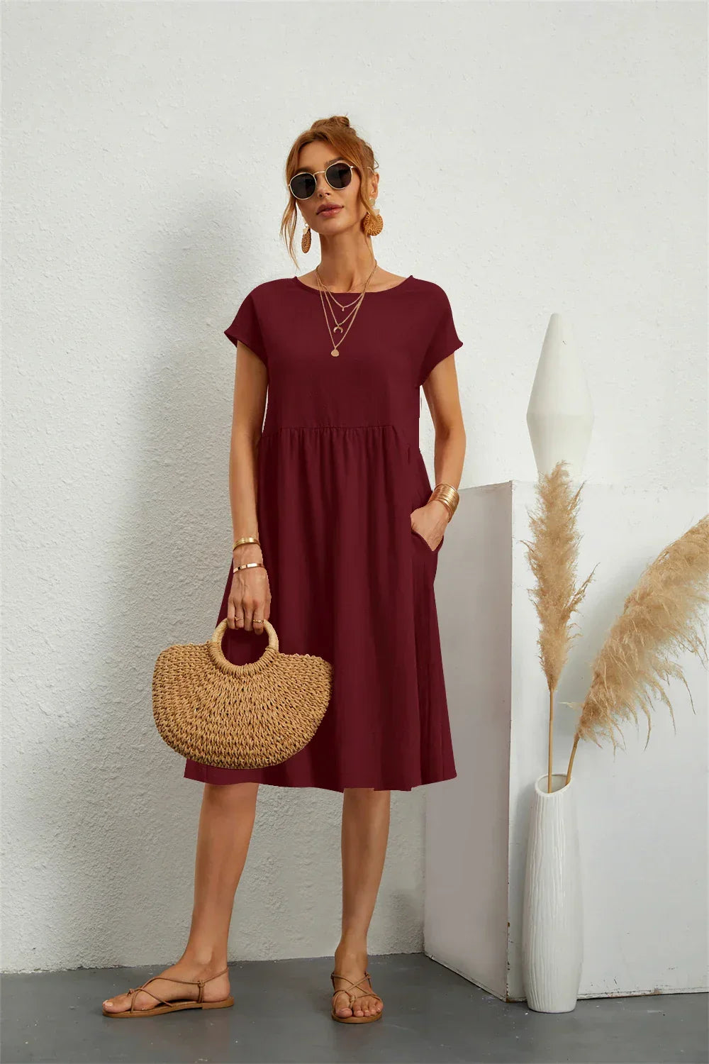 Chic women's casual midi dress featuring pockets, perfect for effortless spring & summer fashion.