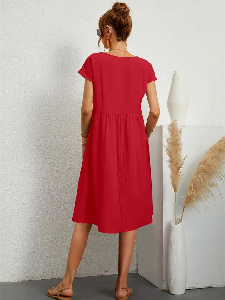 Comfortable women's casual midi dress with pockets for summer & spring everyday wear.