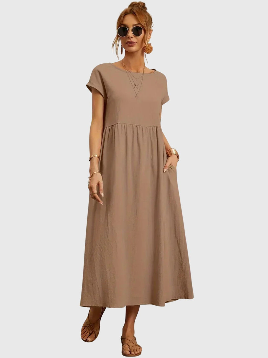 Front view of a solid color women's casual pocket dress, ideal for everyday comfort and versatile styling.