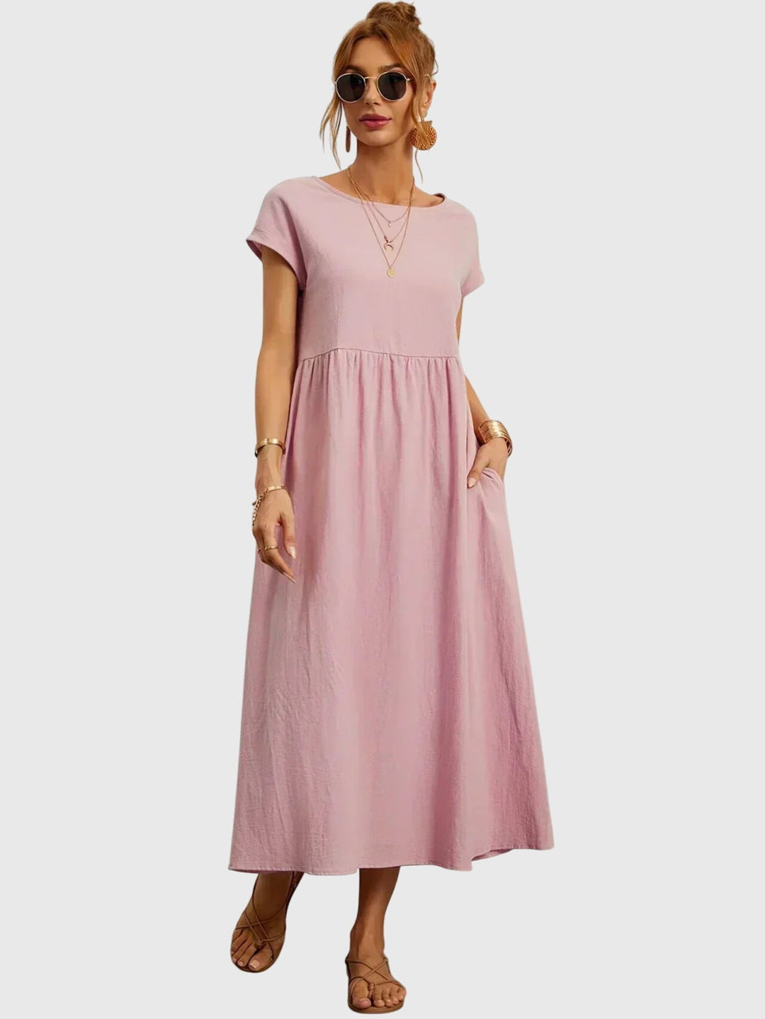 Side view of a relaxed fit women's summer dress, a chic casual midi dress that's comfortable & stylish.