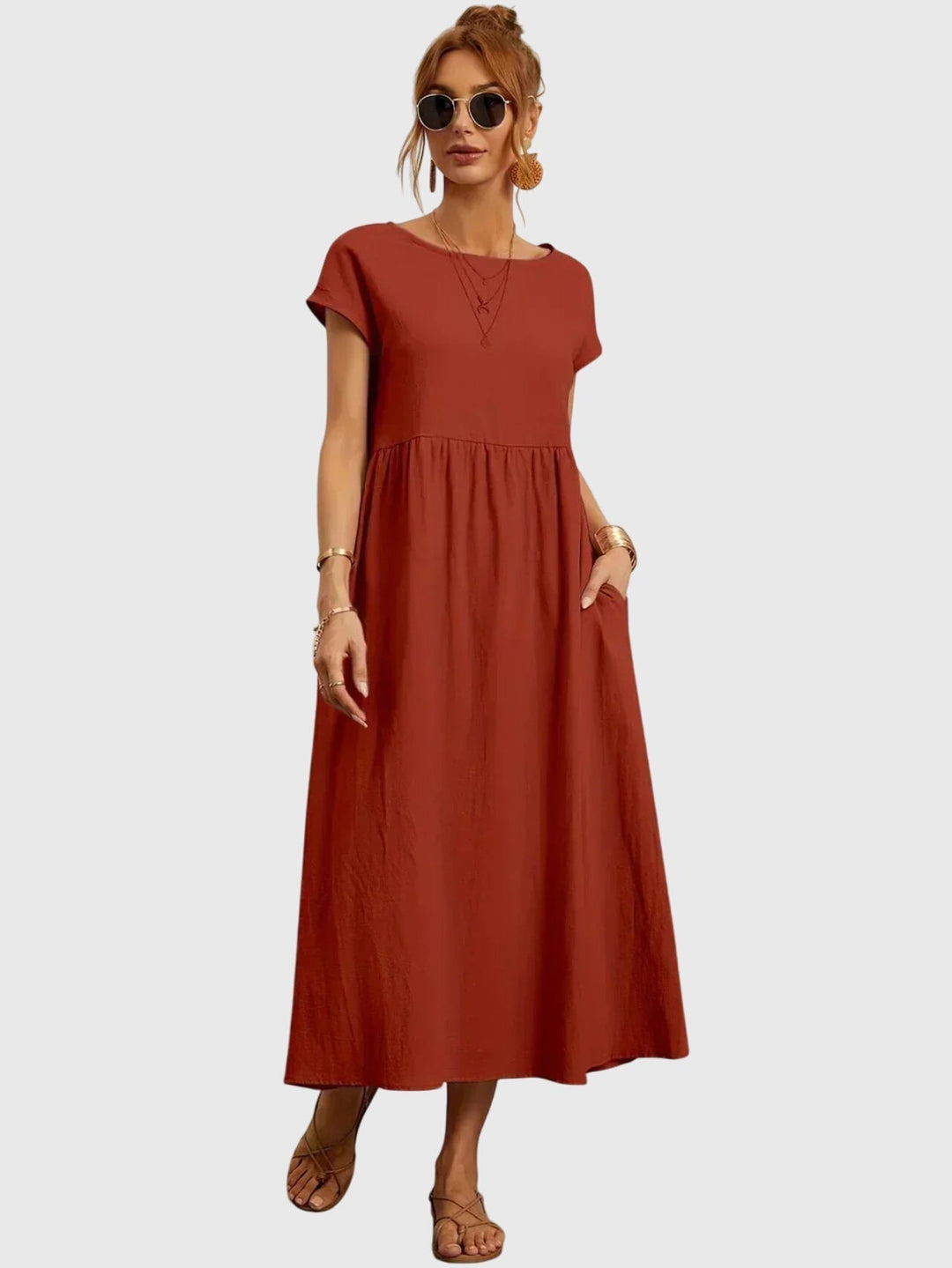 Back view of a simple yet elegant solid color women's casual dress, offering effortless everyday style.